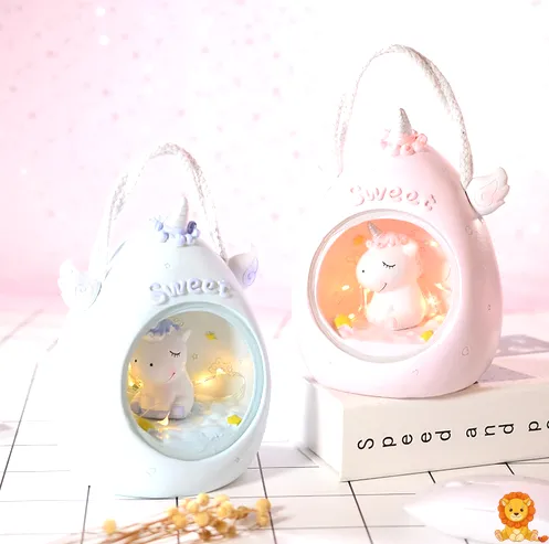 Veilleuse licorne aux couleurs pastel